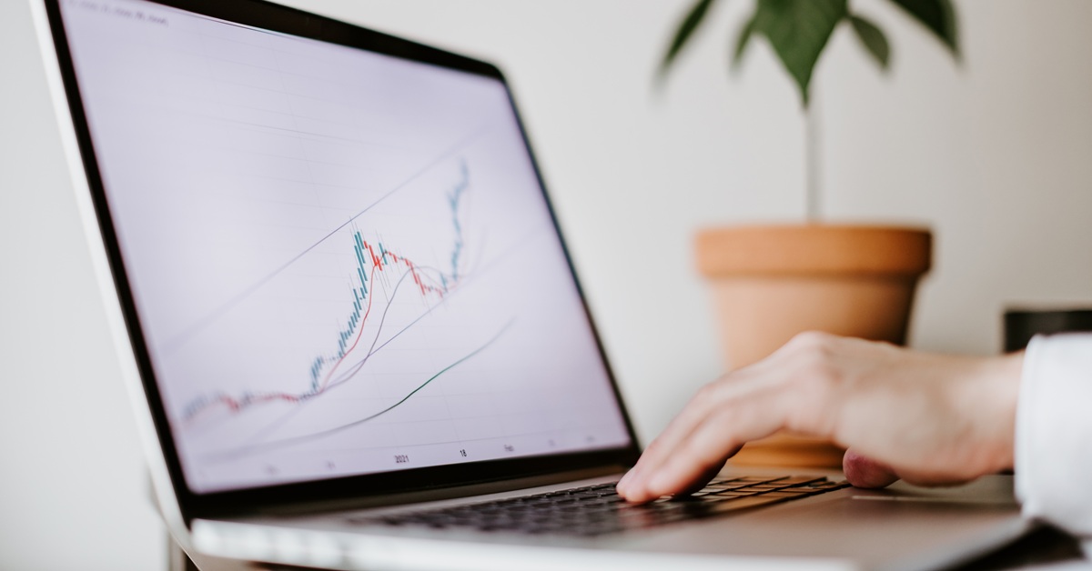 Laptop showing upward chart